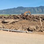 FOTO 22 Febr_Alat berat membantu membersihkan material potongan kayu yang menutupi areal persawahan pascabanjir di Toweran, Kec Lut Tawar, Kab Aceh Tengah, Prov Aceh