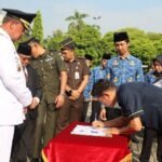 FOTO 2 Mei_Penandatanganan kerja sama dengan PT Bahana Mega Prestasi dalam rangka membuka akses informasi dan peluang kerja ke luar negeri, khususnya ke Taiwan.